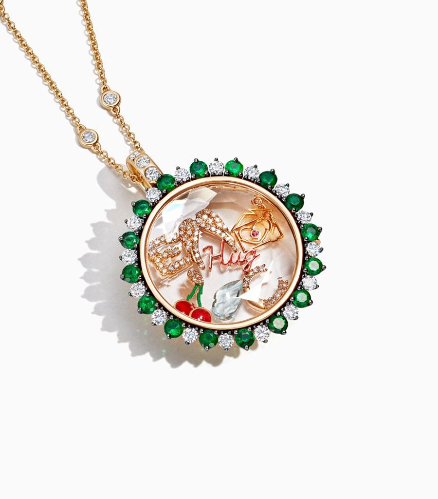 Emerald and diamonds locket necklace styled with 18k gold charms by Loquet London