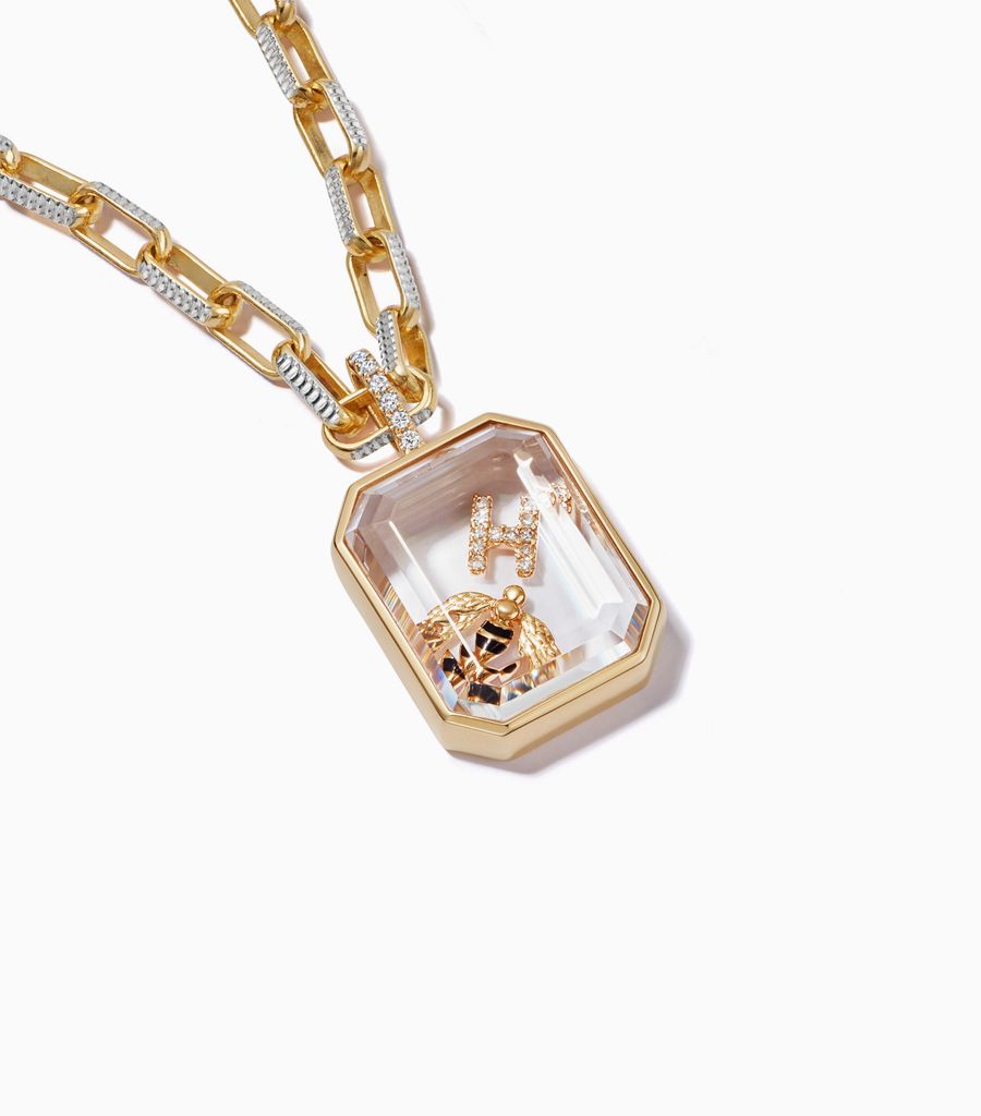 Diamond baguette locket necklace styled with 18k charms by Loquet London