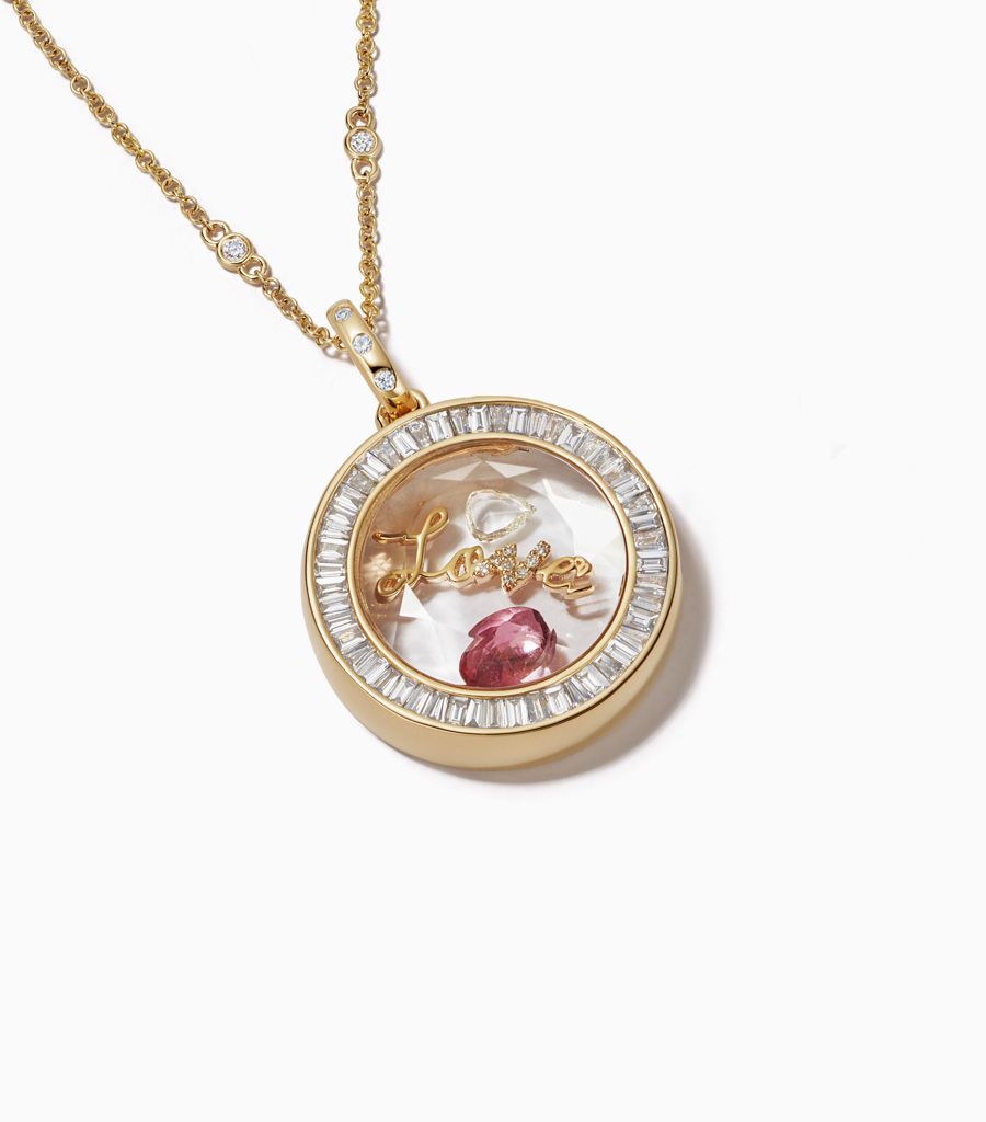 Diamond baguette locket yellow gold 14k styled on a diamond chain and personalised with a diamond charm, a love charm and a birthstone charm