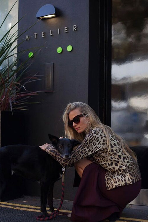 Loquet London's Co-Founder and Creative Director Laura Bailey with her rescue dog Frankie